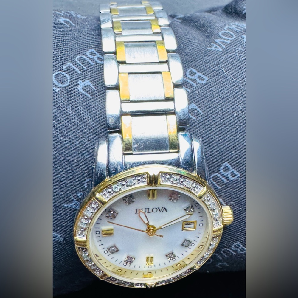 Bulova Two-Tone Stainless Mother of Pearl, Diamond Bezel Date Indicator Watch - Picture 12 of 15